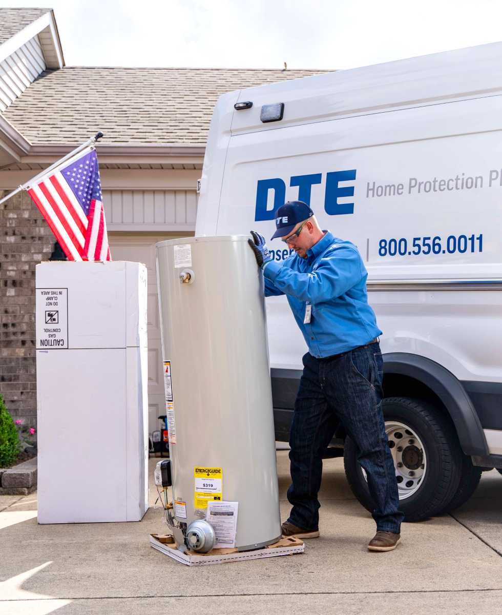 DTE technician installing a new water heater